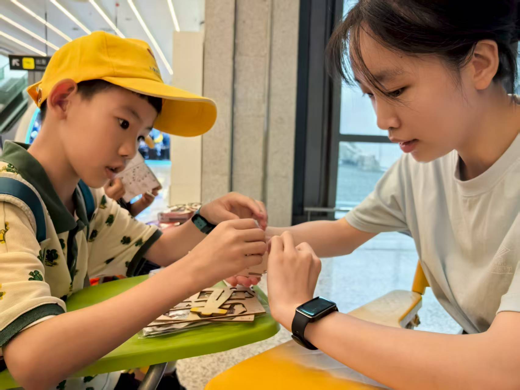 左手牵童心，右手拾非遗